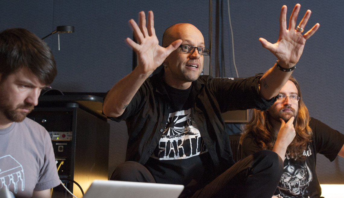 Digital musician Robert Henke, center, in his class 'Music 223M: Sound, Structure, and Machines.' On Thursday and Friday Henke will present Stanford Dust at Bing Concert Hall Studio as the culmination of his time as Stanford's 2013 Mohr Visiting Artist.